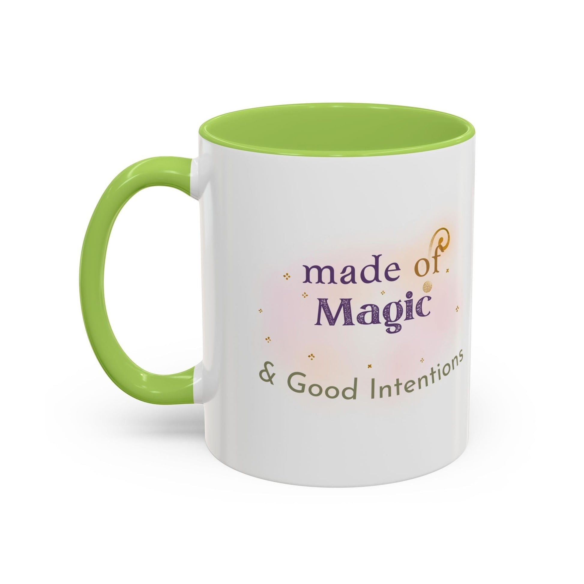 Jena Jewelry white ceramic mug with a bright green handle and interior, featuring the text "made of Magic & Good Intentions" in purple and green.