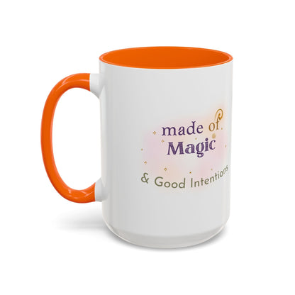 Jena Jewelry white ceramic mug with orange handle and interior, featuring "made of Magic & Good Intentions" text.