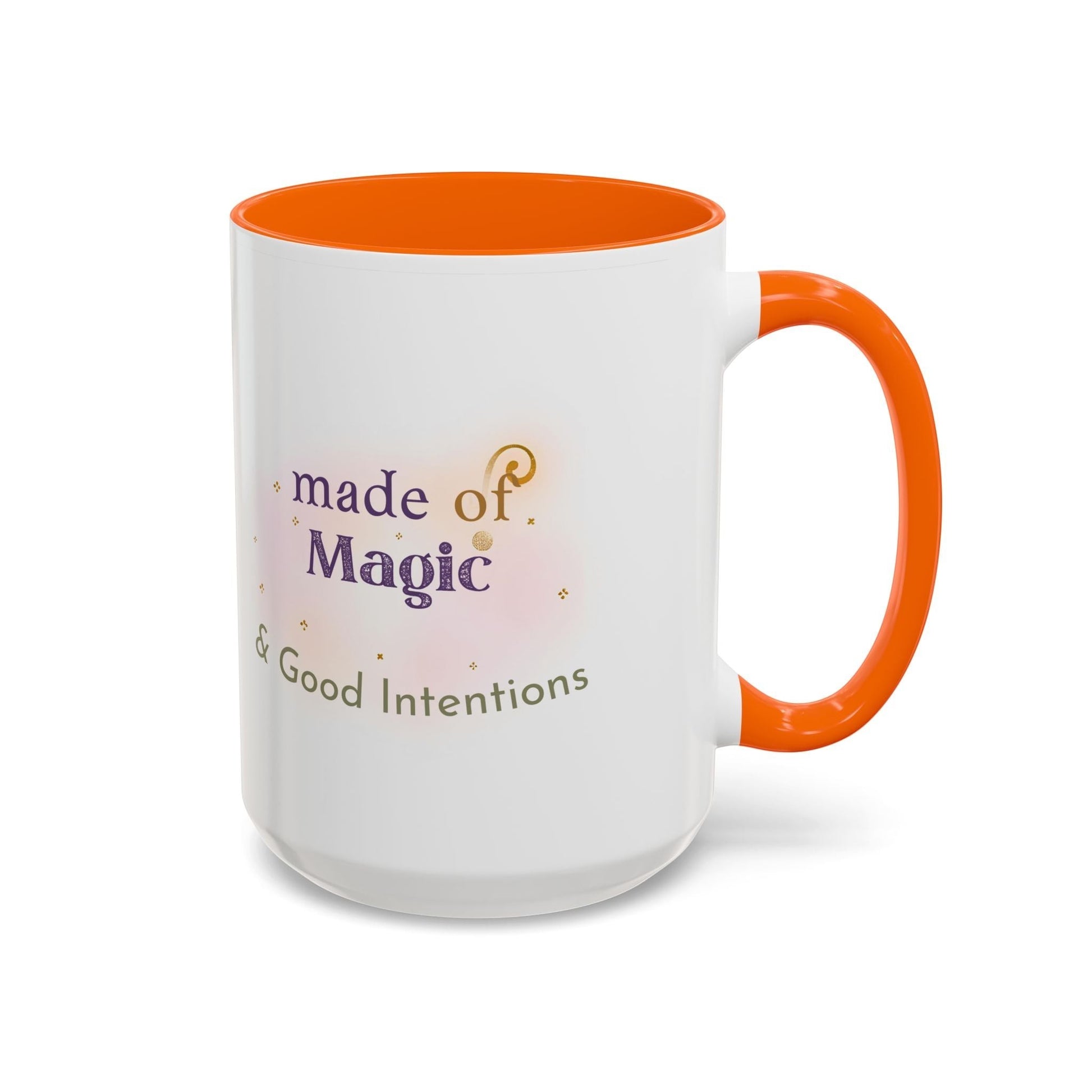 Jena Jewelry white ceramic mug with orange handle and interior, featuring "made of Magic & Good Intentions" text and watercolor accents.