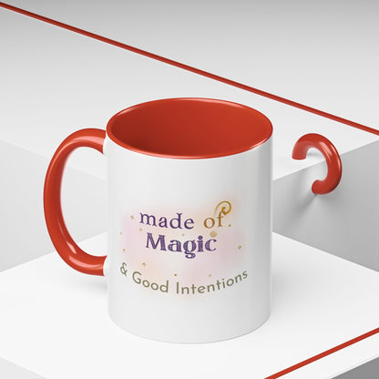 Jena Jewelry white ceramic mug with red interior and handle, featuring "made of Magic & Good Intentions" text.