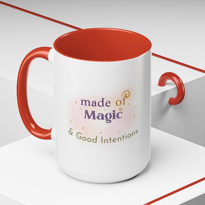 Jena Jewelry white ceramic mug with red interior and handle, featuring "made of Magic & Good Intentions" text and watercolor design.