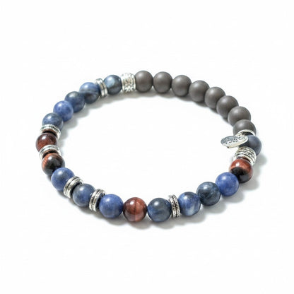Jena Jewelry bracelet with lapis lazuli, red tiger eye, hematite, and ebony mala beads spelling 'Breathe' in Morse code.