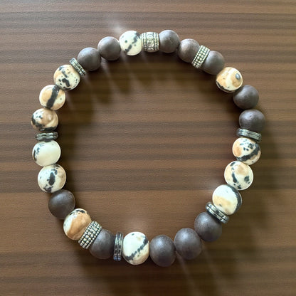 Jena Jewelry bracelet with coffee jasper, ebony wood, and hematite beads spelling 'I Love You' in Morse code.