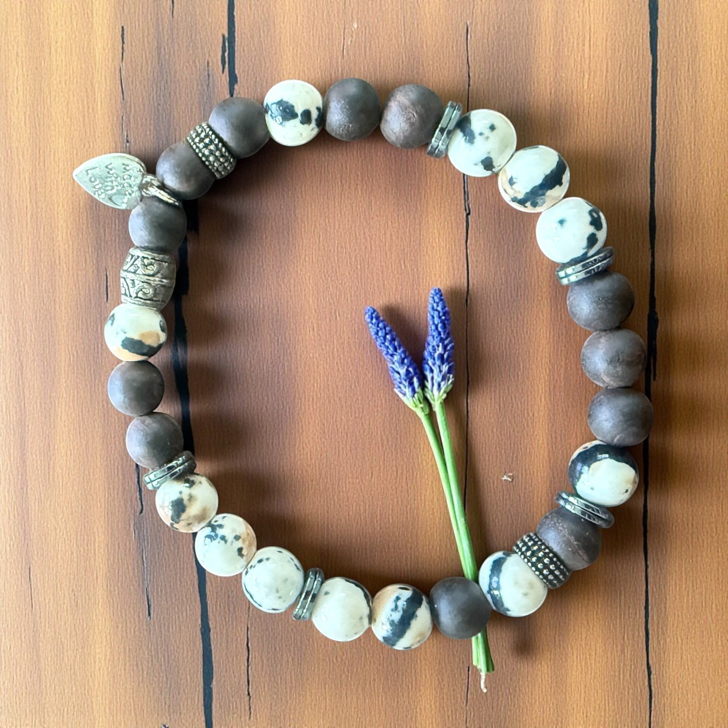 Jena Jewelry bracelet with coffee jasper, ebony wood, and hematite beads spelling 'I Love You' in Morse code.