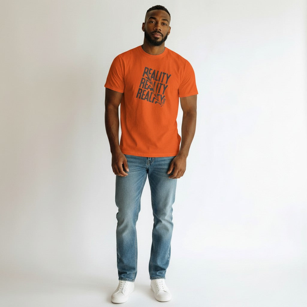 Jena Jewelry orange 100% cotton t-shirt with distressed diagonal text graphic reading "REALITY" three times.