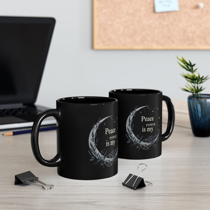 Jena Jewelry black ceramic mug with "Peace is my Power" text, crescent moon, lavender, and pentagram design. Ideal for mindfulness.