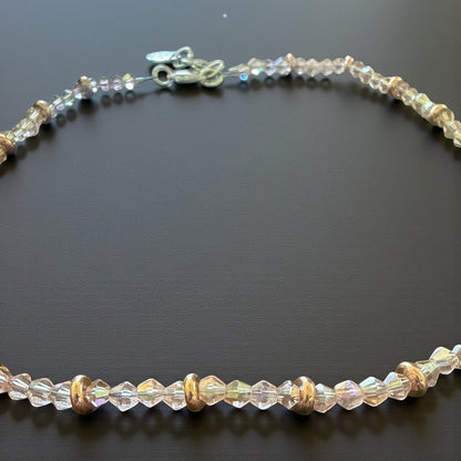 Jena Jewelry delicate pink crystal necklace with rose gold spacers, featuring faceted crystals and smooth rondelles.