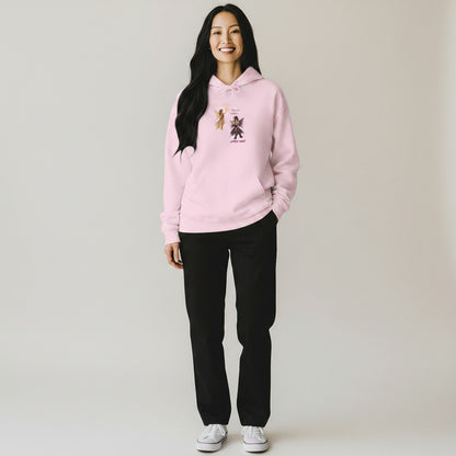 Jena Jewelry light pink cotton-poly blend hoodie with 'Angel vs Demon Illustration Better Half' graphic on chest. Features a kangaroo pocket and drawstring hood.