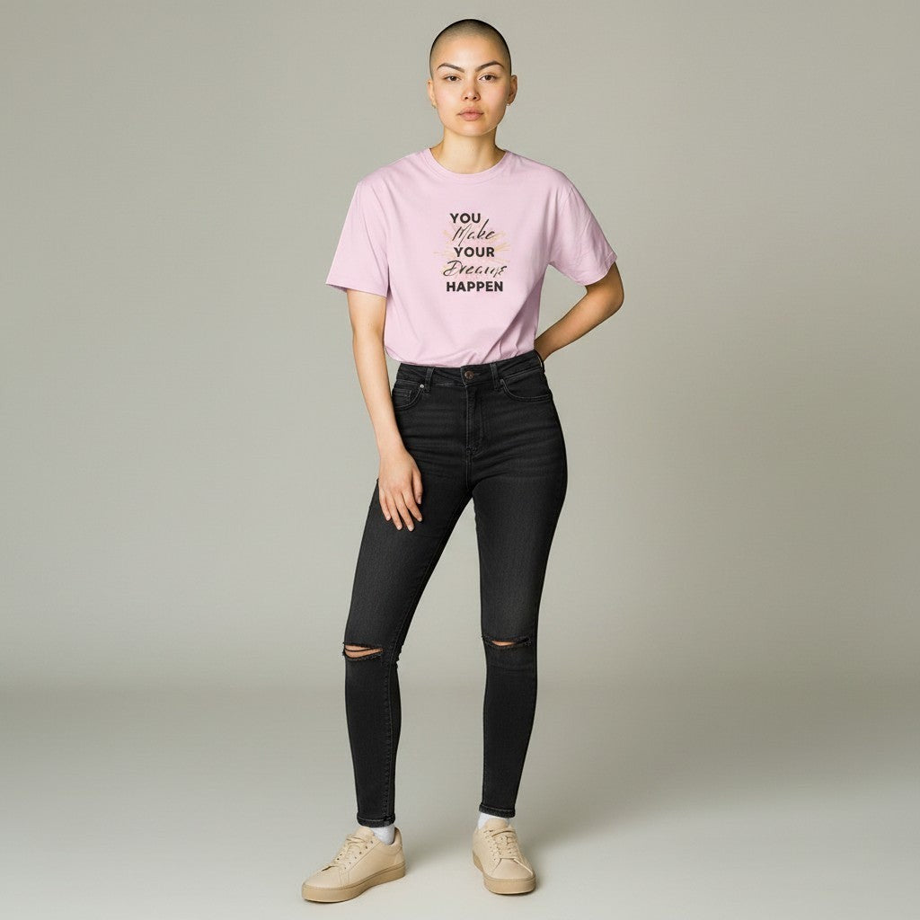 Jena Jewelry light pink 100% cotton t-shirt with "You Make Your Dreams Happen" graphic print and sunburst accents.
