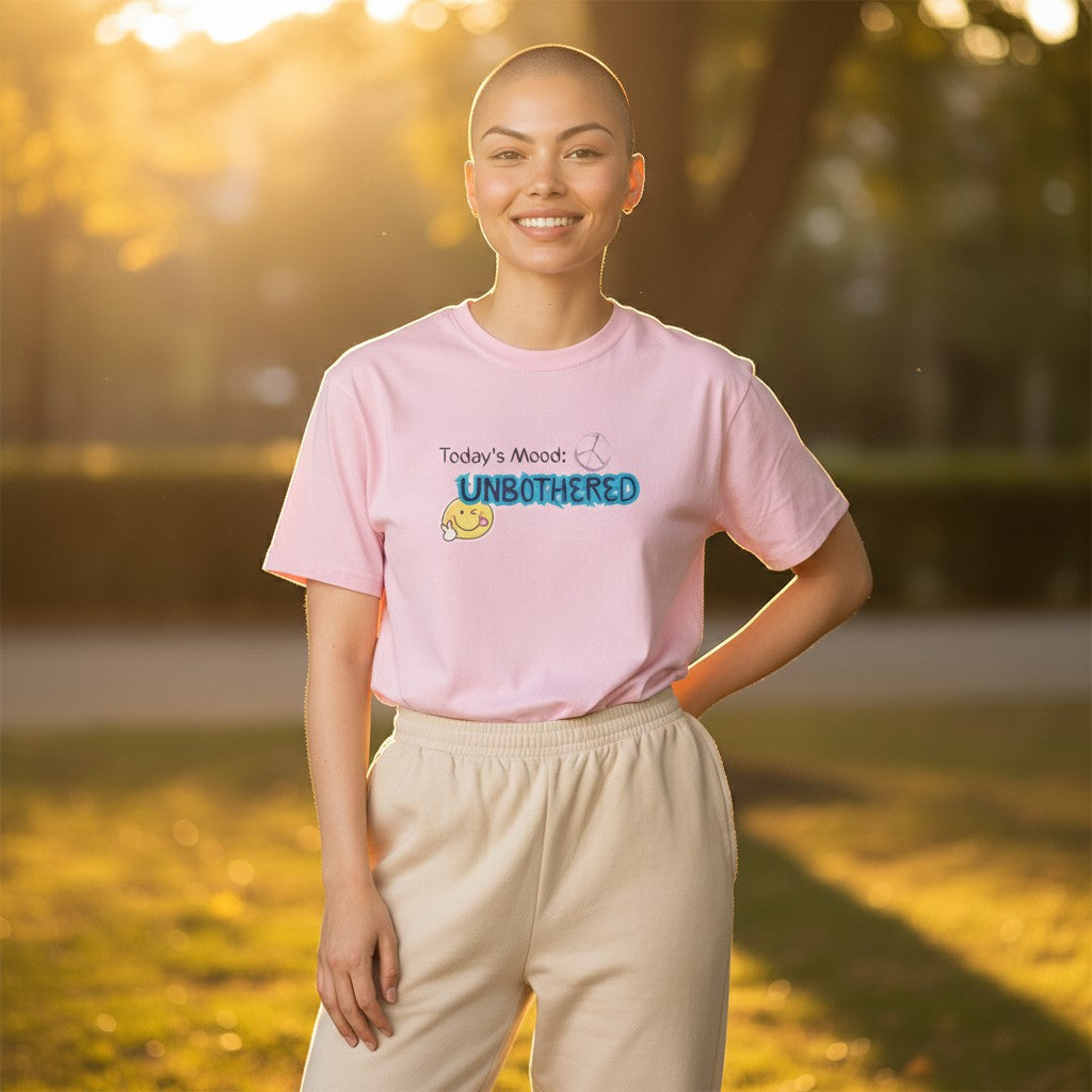 Jena Jewelry light pink cotton t-shirt with "Today's Mood: UNBOTHERED" graphic and smiley face.