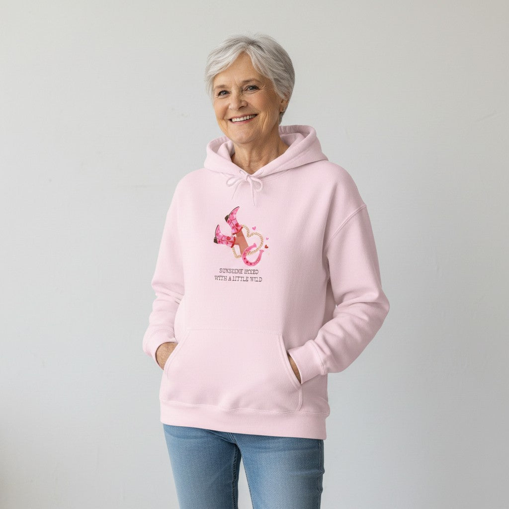 Jena Jewelry light pink cotton-poly blend hoodie with a graphic of pink cowboy boots and a horseshoe.