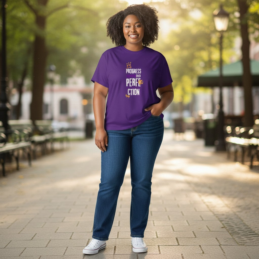 Jena Jewelry purple 100% cotton t-shirt with 'Progress Over Perfection' graphic in white and gold. Relaxed fit, crew neck.