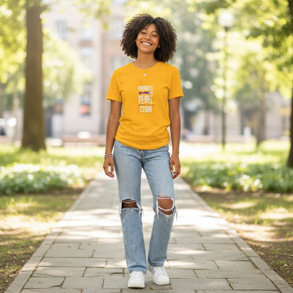 Jena Jewelry yellow 100% cotton t-shirt with "Progress Over Perfection" graphic in purple and gold. Relaxed fit, crew neck.