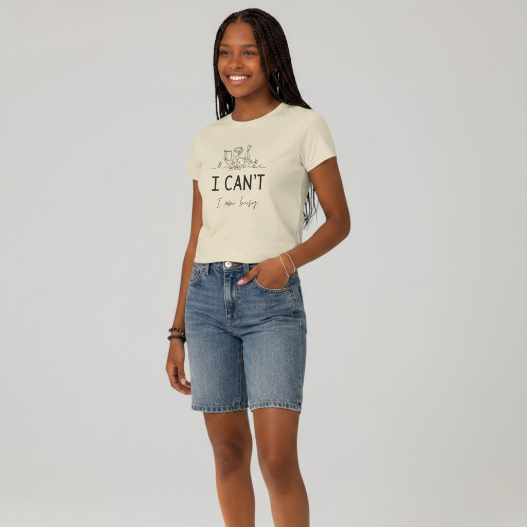 Jena Jewelry cream 100% cotton relaxed fit t-shirt with a line drawing of a person reading and the text "I CAN'T I am busy".