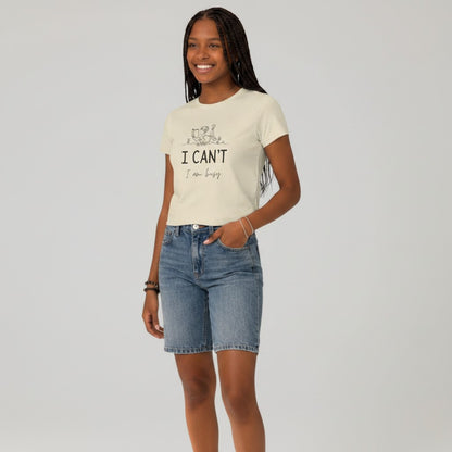 Jena Jewelry cream 100% cotton relaxed fit t-shirt with a line drawing of a person reading and the text "I CAN'T I am busy".