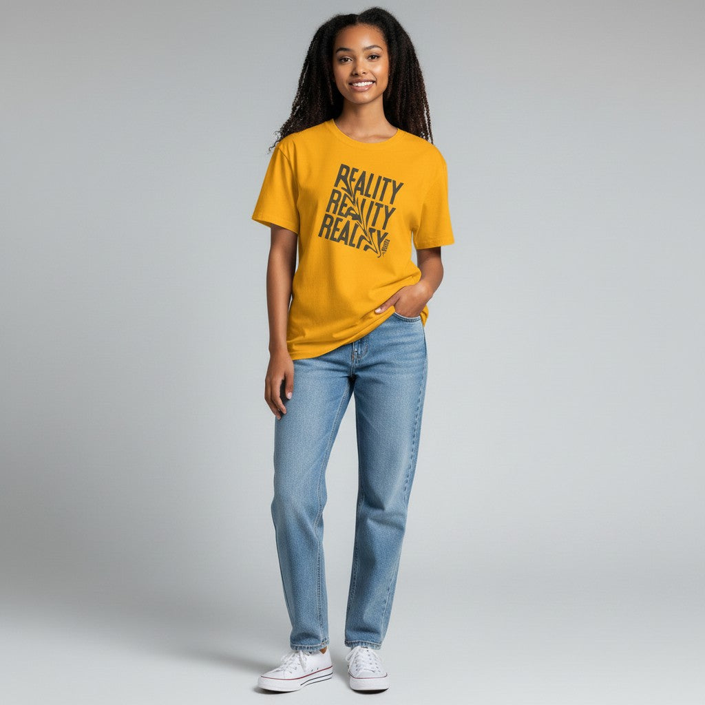 Jena Jewelry yellow 100% cotton t-shirt with distressed diagonal text graphic reading "REALITY" three times.