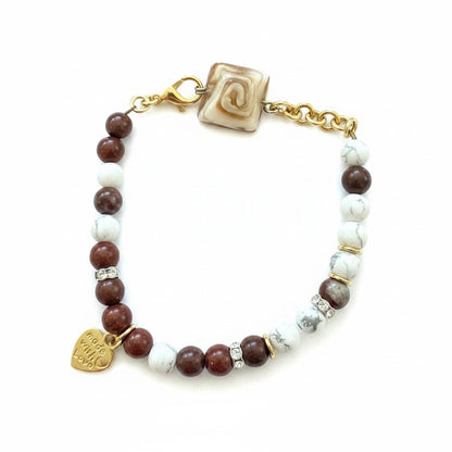 Jena Jewelry red jade and howlite beaded bracelet with gold-tone chain, rhinestones, and heart charm. Size 7".