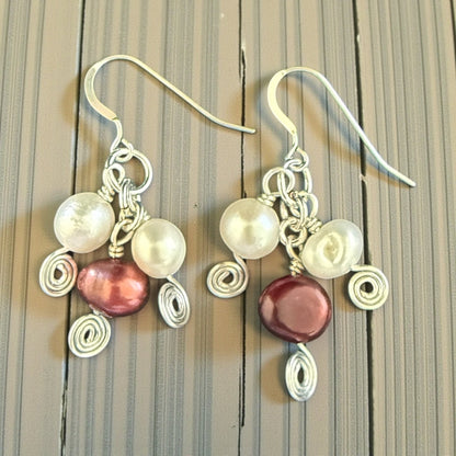 Jena Jewelry cluster freshwater pearl drop earrings in deep red and white, with silver-tone wire wrapping and hypoallergenic ear wires.
