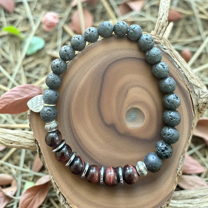 Jena Jewelry red tiger eye, hematite, and lava stone stretch bracelet with silver accents. Features a small heart charm.