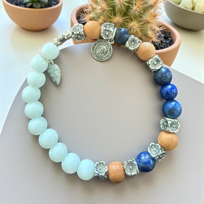 Jena Jewelry rosary bracelet with snow jade, lapis lazuli, sandalwood beads, cross, and miraculous medal.