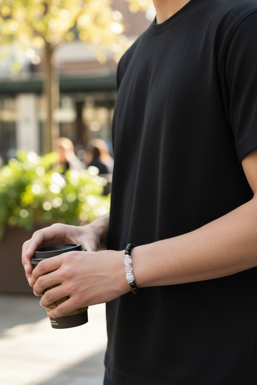 Jena Jewelry stretch bracelet with rose quartz and hematite beads, designed for love, strength, and balance.