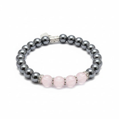 Jena Jewelry stretch bracelet with rose quartz, magnetic hematite, and hematite beads, accented with silver spacers.