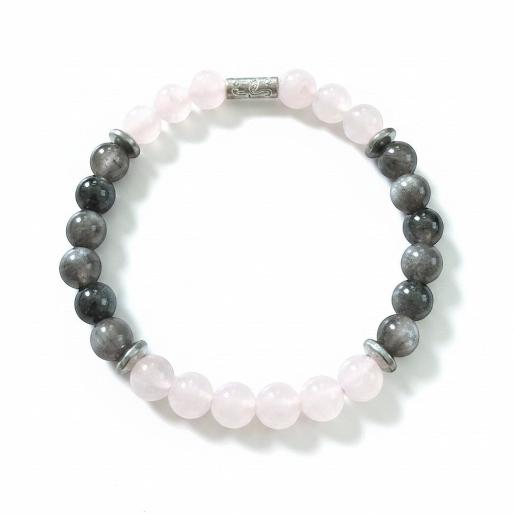 Jena Jewelry stretch bracelet with rose quartz, silver obsidian, and hematite beads, featuring a central silver accent bead.