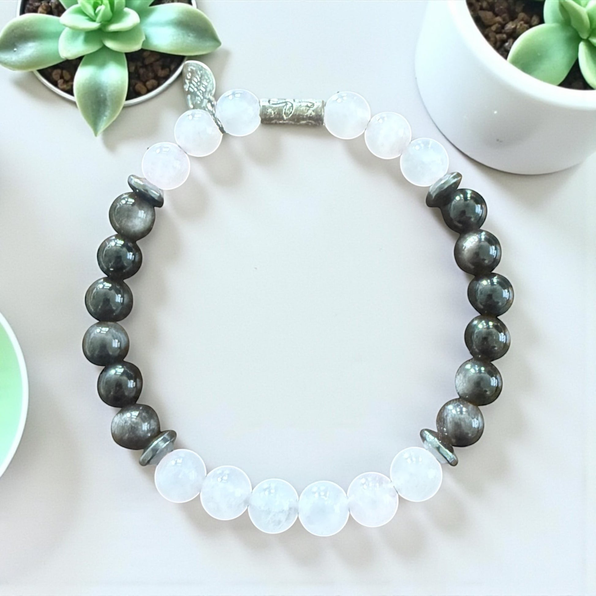 Jena Jewelry Rose Quartz, Silver Obsidian & Hematite stretch bracelet with heart healing & protective properties.
