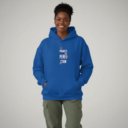 Jena Jewelry royal blue cotton-polyester blend hoodie with "Progress Over Perfection" graphic. Features kangaroo pocket and drawstring hood.