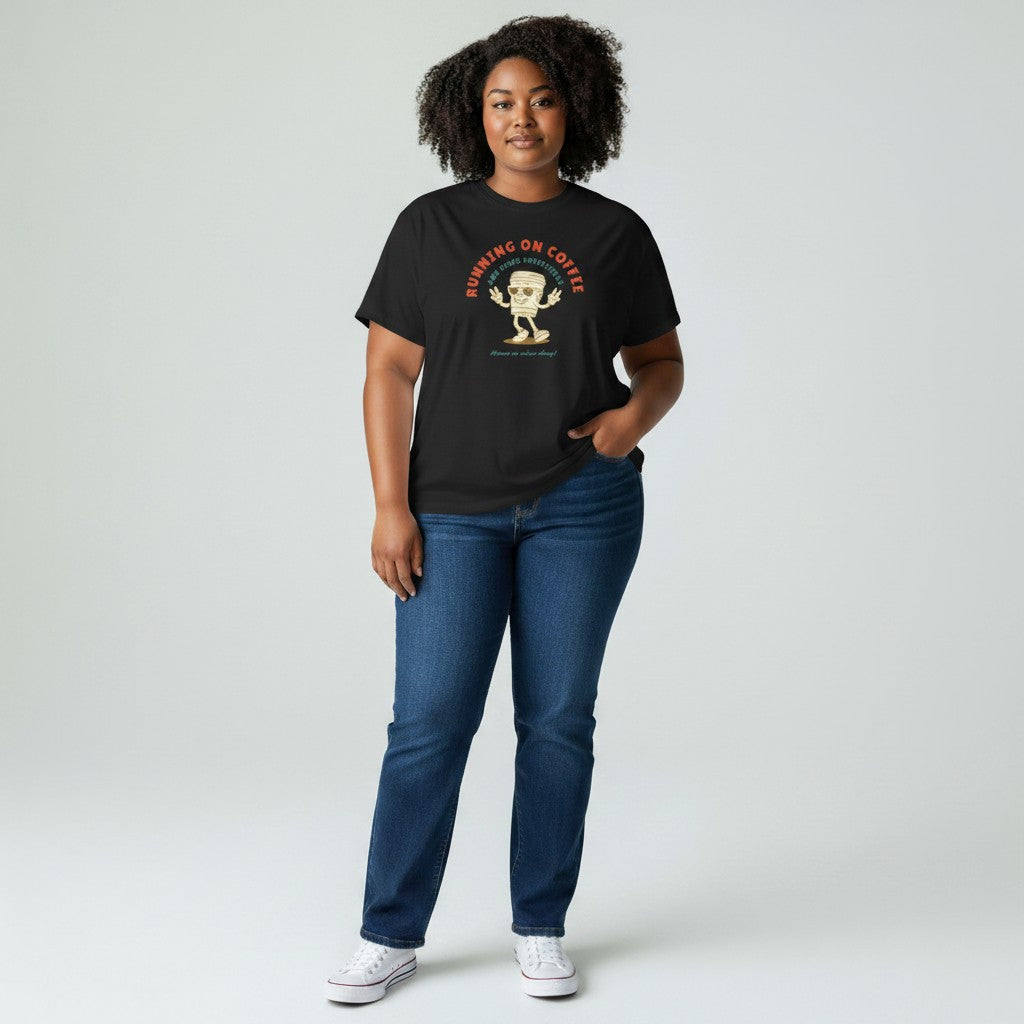 Jena Jewelry black 100% cotton t-shirt with a retro graphic of a smiling coffee cup and the text "RUNNING ON COFFEE AND GOOD INTENTIONS".