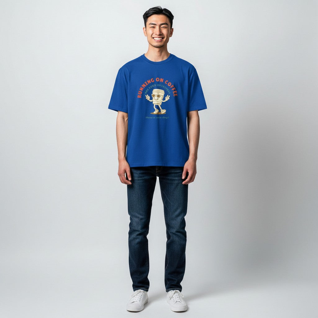 Jena Jewelry blue 100% cotton t-shirt with a retro coffee cup graphic that says "RUNNING ON COFFEE AND GOOD INTENTIONS".