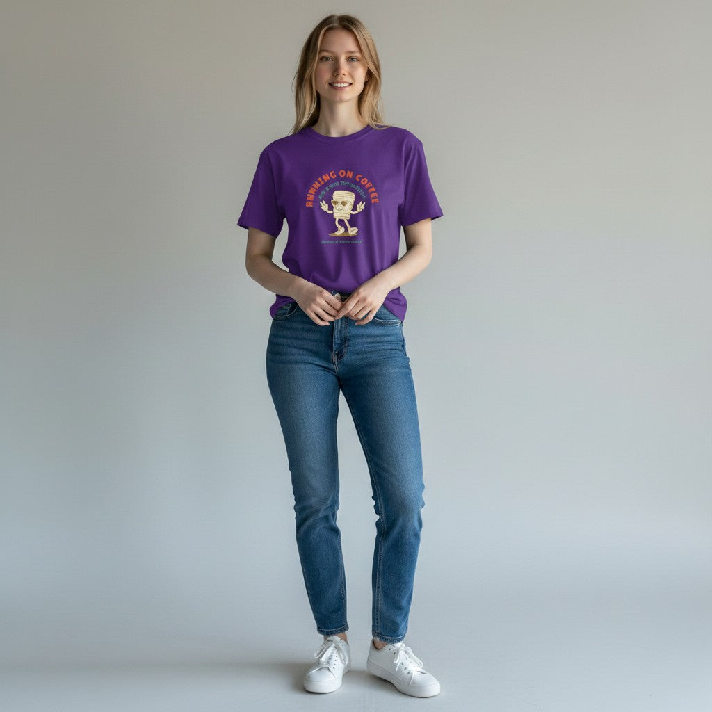 Jena Jewelry purple 100% cotton t-shirt with a retro graphic of a smiling coffee cup and the text "RUNNING ON COFFEE AND GOOD INTENTIONS".