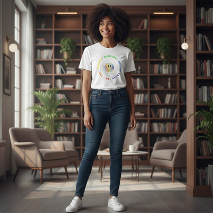 Jena Jewelry white 100% cotton t-shirt with a rainbow smiley face graphic and text that reads "Be The Reason Someone Smiles Today".