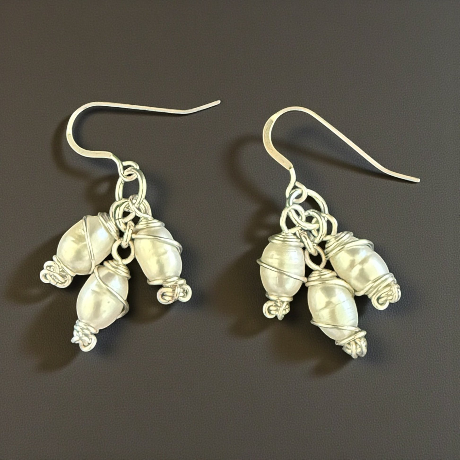 Jena Jewelry elegant spiral freshwater pearl bridal earrings with silver-tone wire. Trio of lustrous pearls clustered with spiral wire drops.