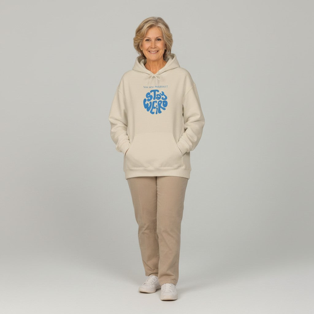 Jena Jewelry cream cotton-poly blend hoodie with blue "STAY WEIRD" graphic and kangaroo pocket.