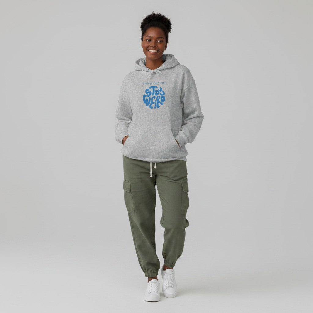 Jena Jewelry light grey heathered cotton-poly blend hoodie with blue "STAY WEIRD" graphic and kangaroo pocket.