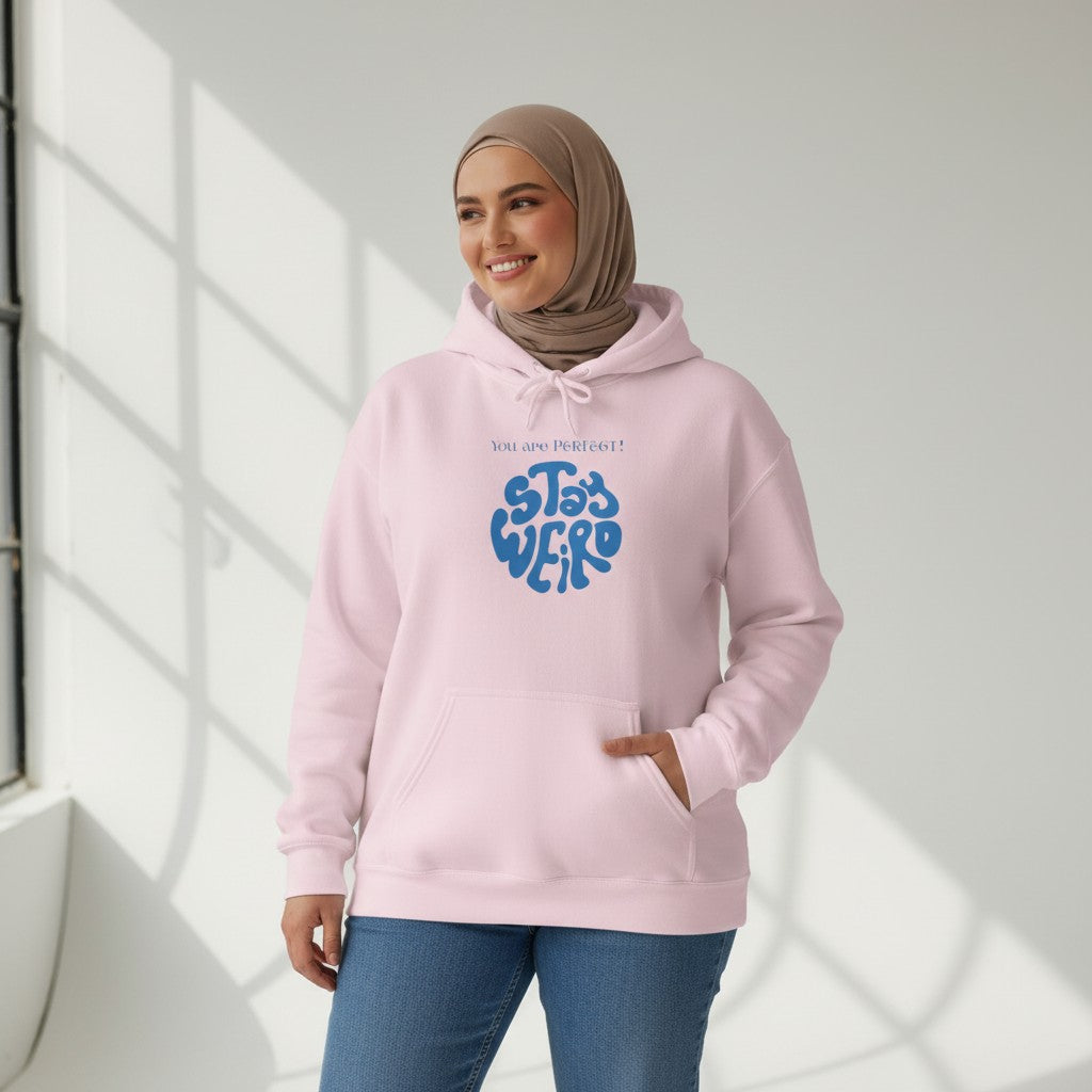 Jena Jewelry light pink cotton-poly blend hoodie with blue "STAY WEIRD" graphic and kangaroo pocket.