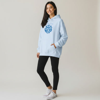 Jena Jewelry white cotton-poly blend hoodie with blue "STAY WEIRD" graphic and kangaroo pocket.