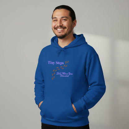 Jena Jewelry royal blue cotton-poly blend hoodie with "Tiny Steps Still Move You Forward" graphic and footprint design.