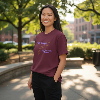 Jena Jewelry maroon 100% cotton t-shirt with "Tiny Steps Still Move You Forward" text and footprint graphic.