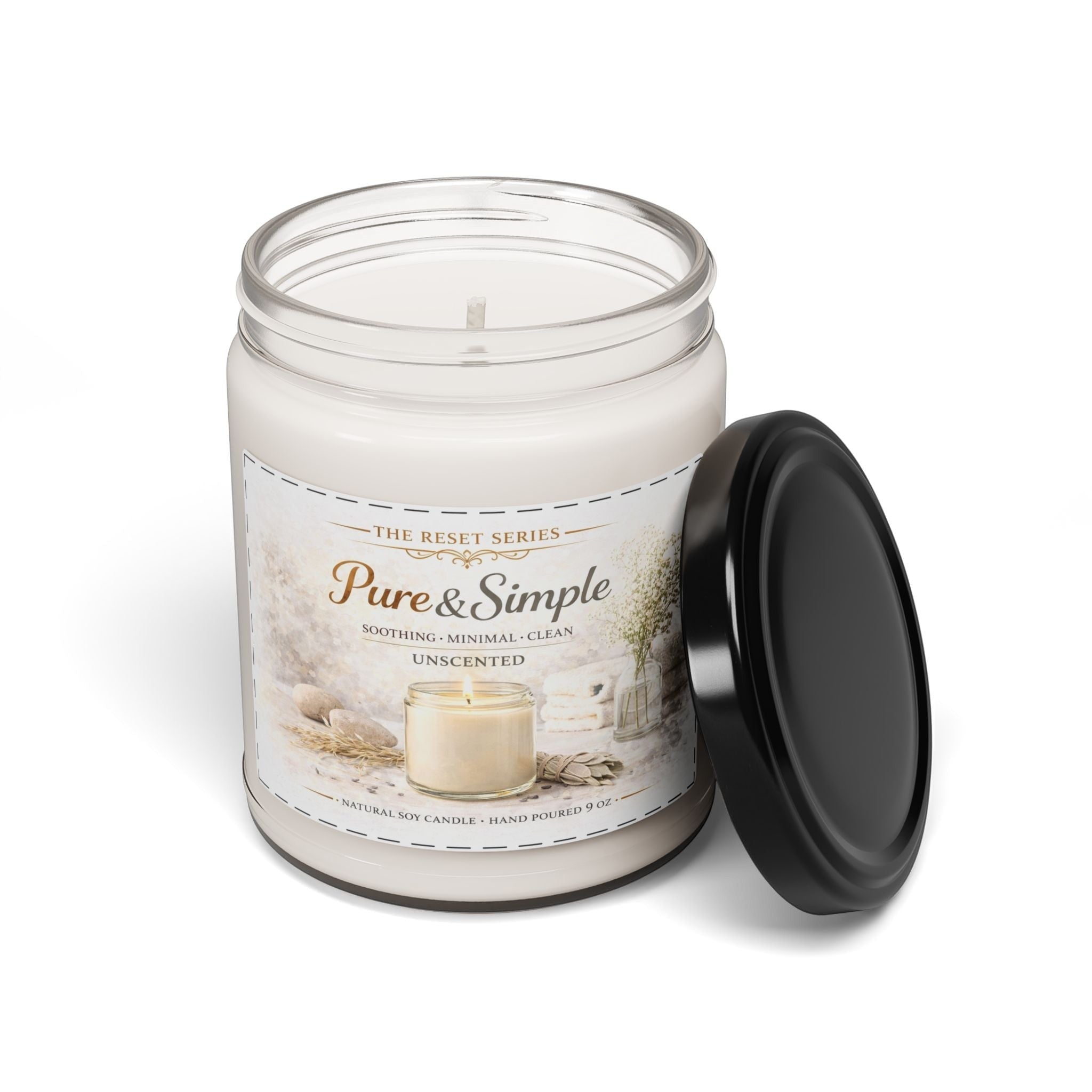 Jena Jewelry unscented soy candle in a clear glass jar with a black lid, featuring a minimalist label.