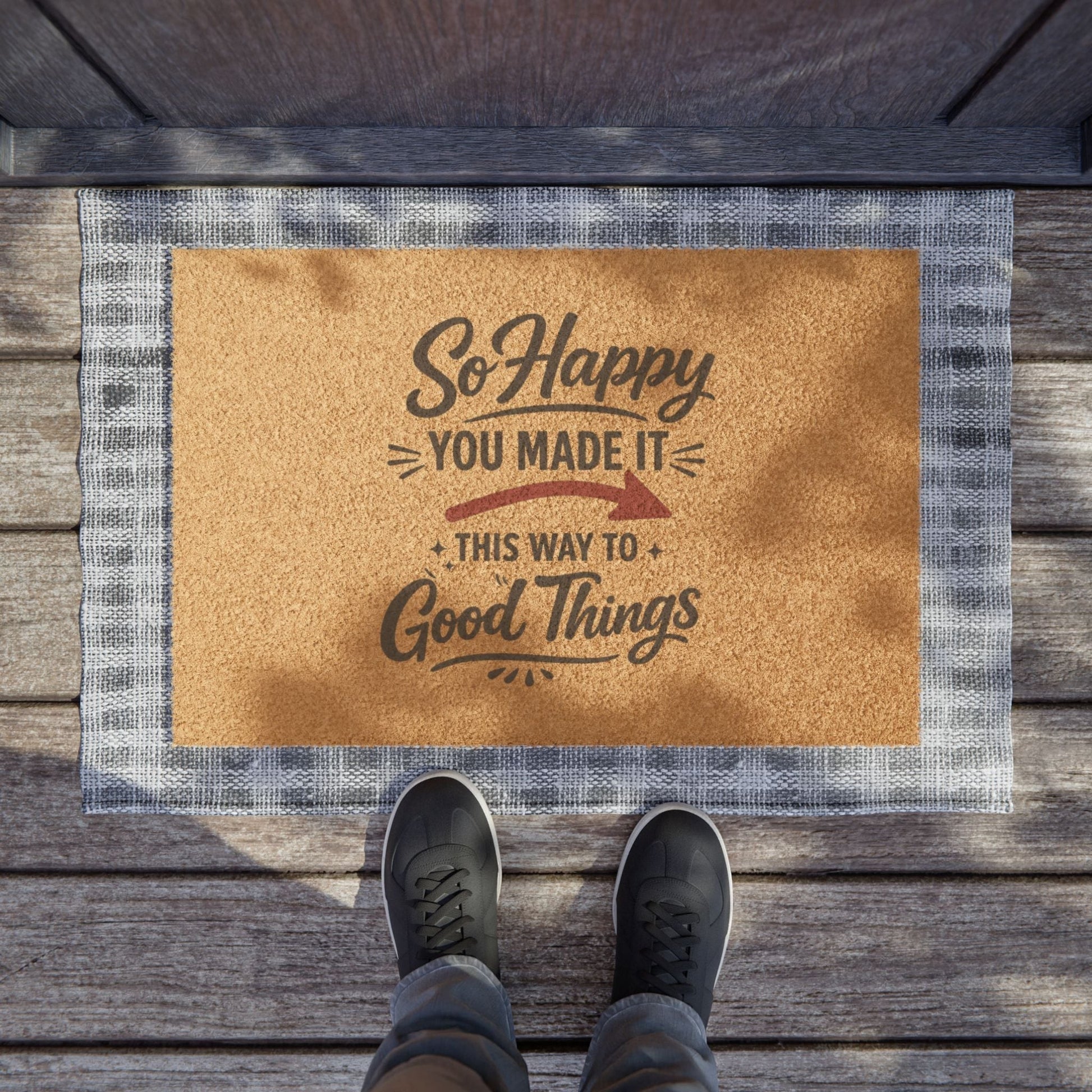 Jena Jewelry minimalist coir doormat with "So Happy You Made It This Way To Good Things" text and a red arrow.