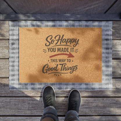 Jena Jewelry minimalist coir doormat with "So Happy You Made It This Way To Good Things" text and a red arrow.
