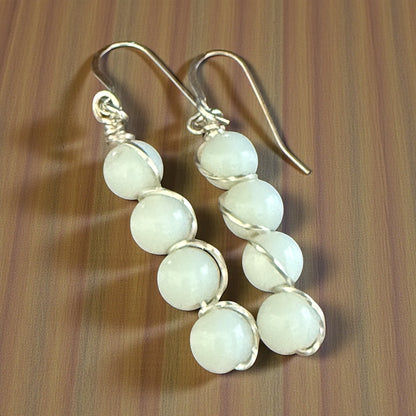 Jena Jewelry stacked white gemstone drop earrings with silver-tone wire wrapping on hypoallergenic ear wires.
