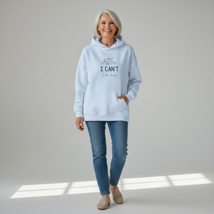 Jena Jewelry white cotton-poly blend hoodie with "I CAN'T, I am busy" text and line art of a person reading.