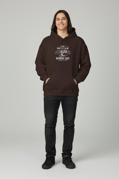 Jena Jewelry brown cotton-poly blend hoodie with white "I’m Pretty Sure I Seized the Wrong Day" graphic text.