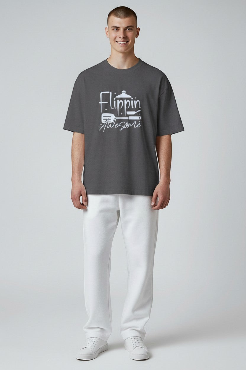 Jena Jewelry men's charcoal grey 100% cotton t-shirt with white "Flippin Awesome" graphic and cooking icons.