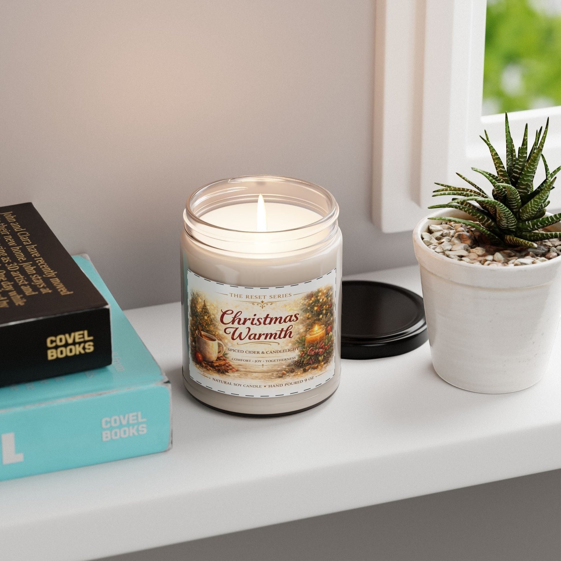 Jena Jewelry Christmas Warmth soy candle with a warm spice, sweet citrus, and cozy woods scent. Festive decor.