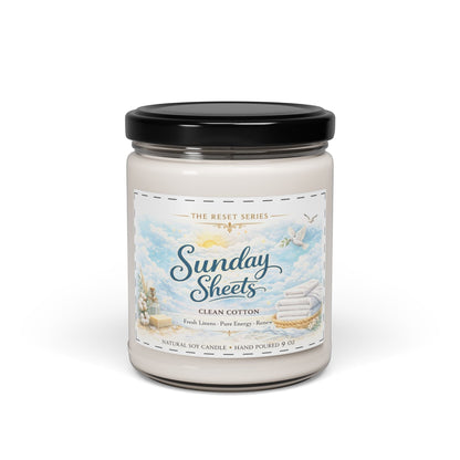 Jena Jewelry Sunday Sheets clean cotton scented soy candle with fresh linen scent, in a reusable glass vessel.
