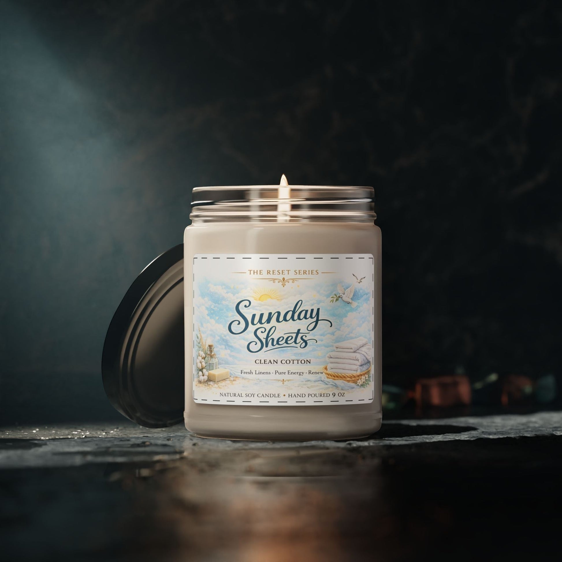 Jena Jewelry Sunday Sheets clean cotton scented soy candle with fresh linen scent. Hand-poured in a reusable glass vessel.